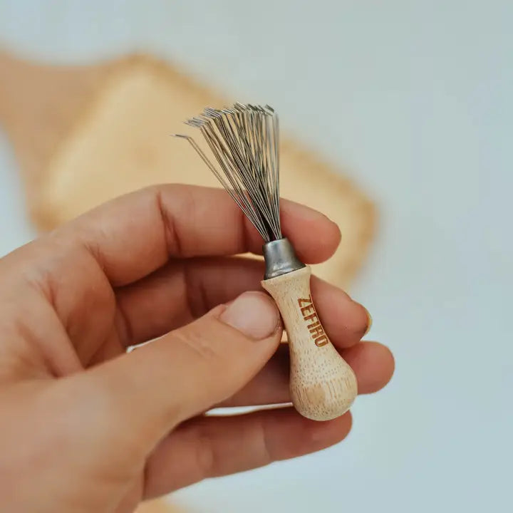 Hairbrush cleaning tool