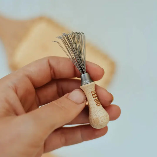 Hairbrush cleaning tool